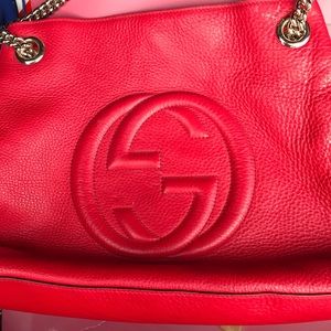 Red Gucci handbag